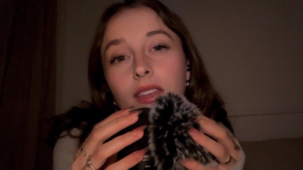 ASMR slow whispers, mouth sounds, mic scratching (bare/fluffy), personal attention in low light