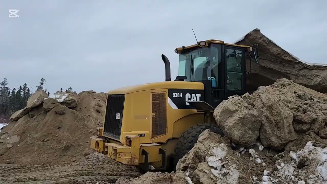 938h load dump trailer with the sand 