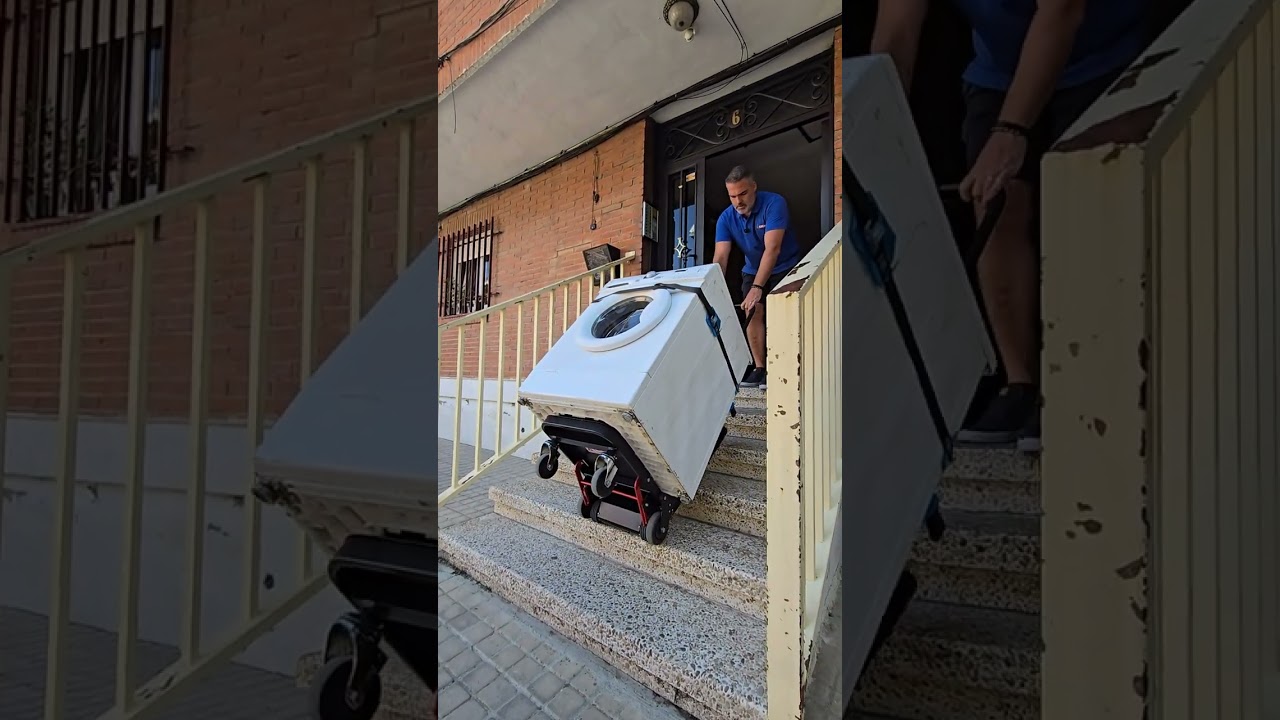 Una persona entrega una lavadora y recoge un frigorífico con la carretilla sube escaleras Gorilla160