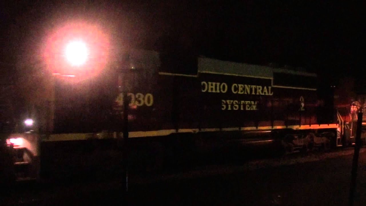 IORY SD45R and OHCR SD40-2 lead loaded stone train in the rain