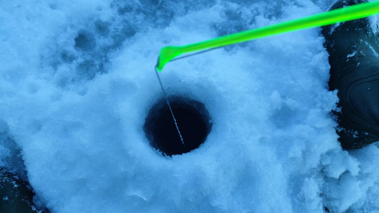 Ice fishing in 5F in small lake.