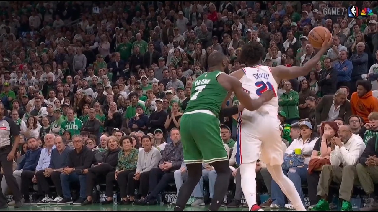 Jaylen Brown fouls Joel Embiid and then immediately flops, sending himself to the floor
