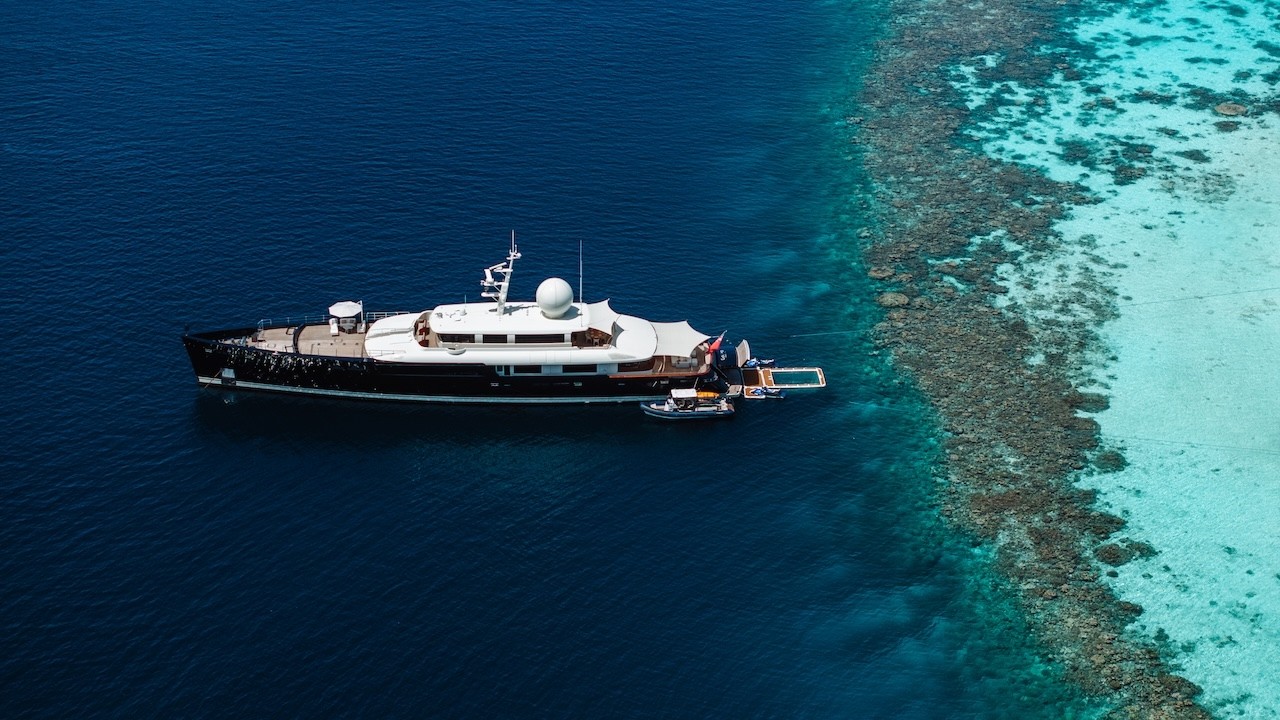Whats Inside An Explorer Yachts Garage| Yacht Galileo Tied to Palm Trees