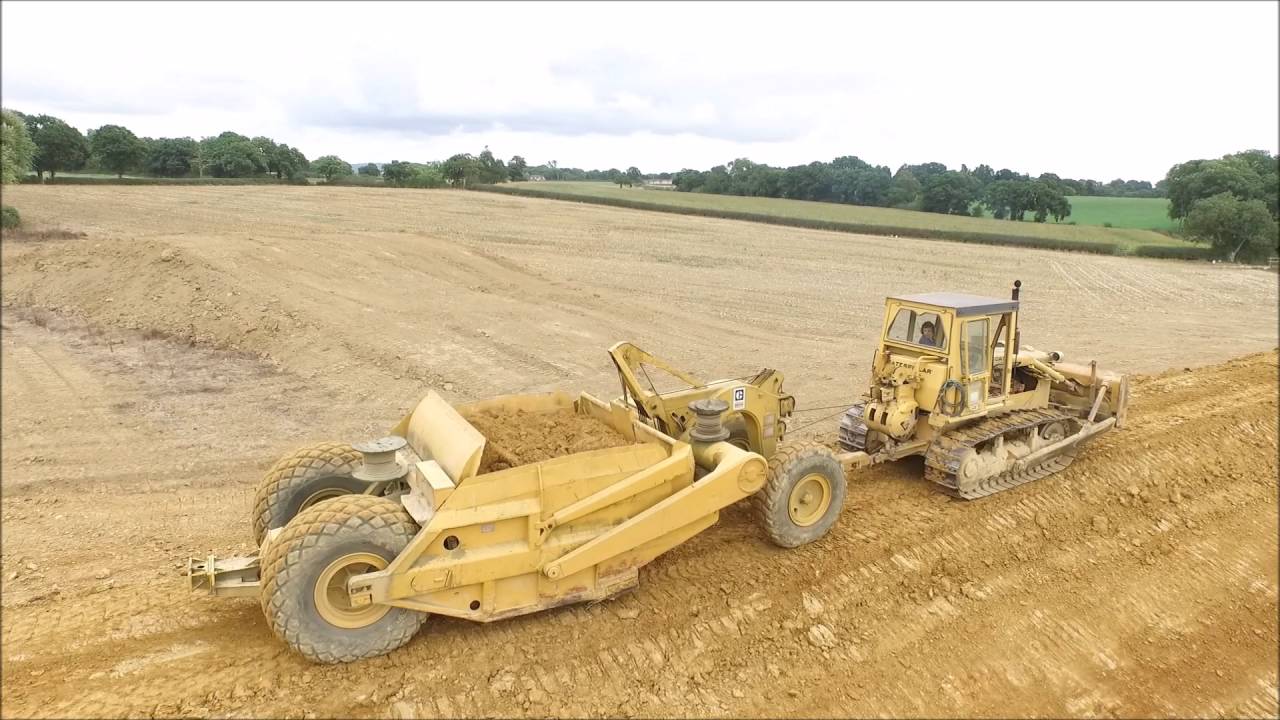 CAT D6D pulling scraper