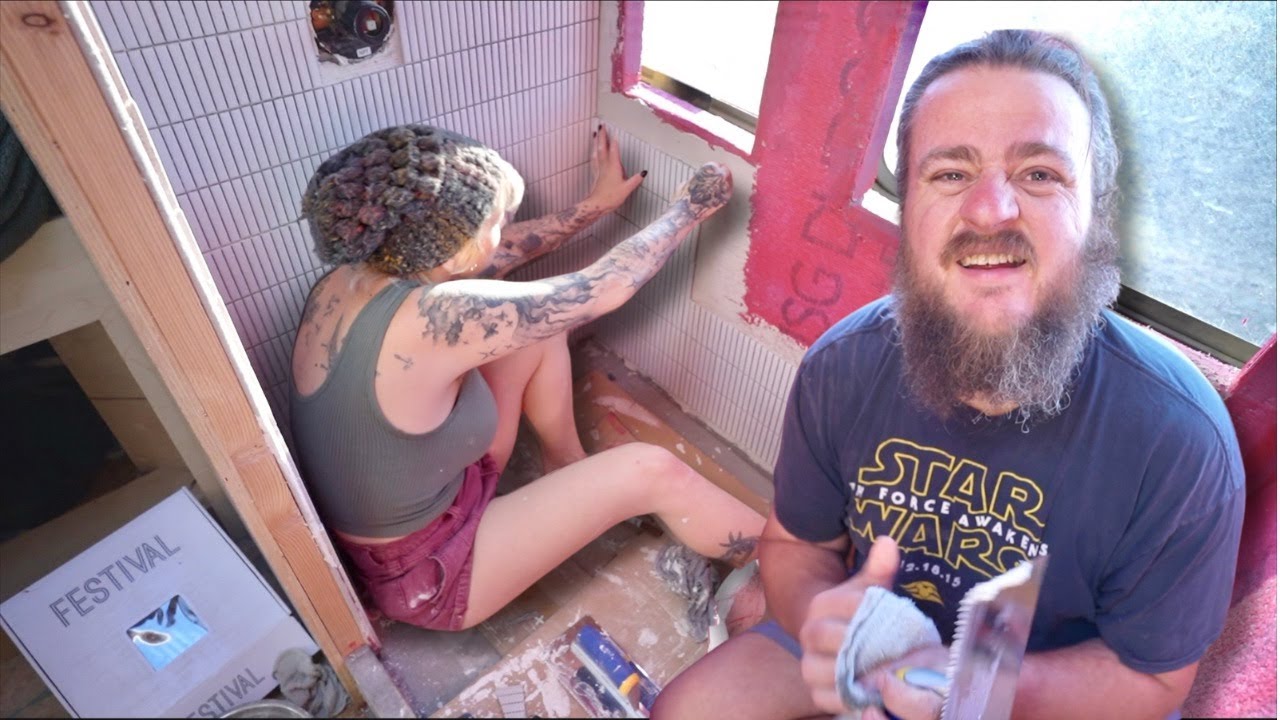 Our first attempt at shower tile + a special bus life birthday 🎉