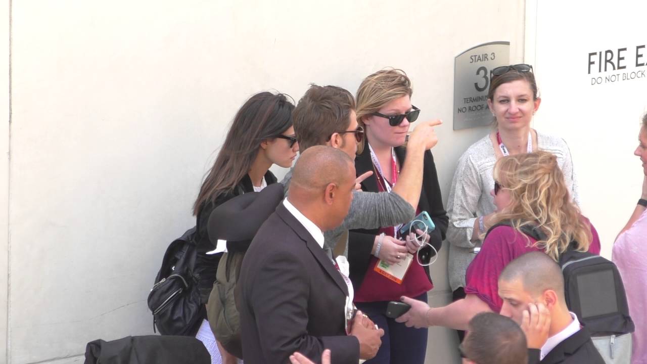 Paul Wesley and Phoebe Tonkin waiting for their car at Comic Con