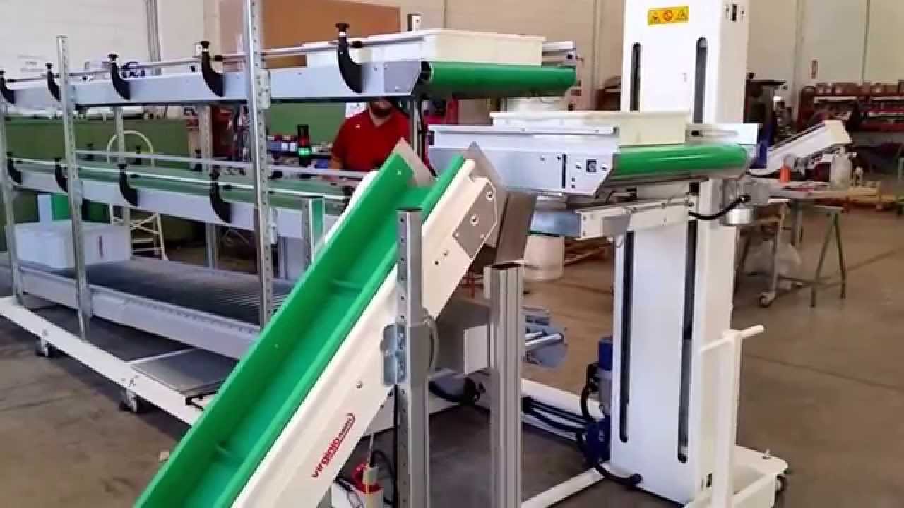 Lift stacking system Virginio Nastri per magazzino pezzi plastici bordo pressa