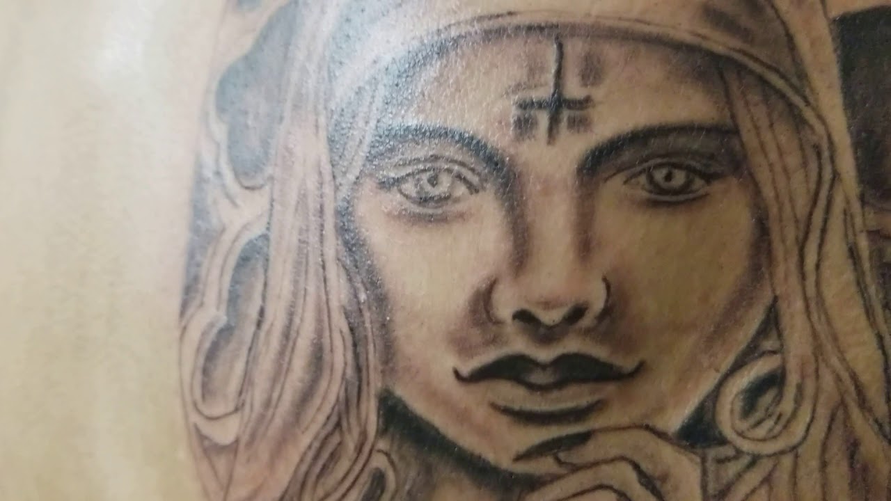 Madonna tattoo realistic on male upper back finished, September 08, 2017