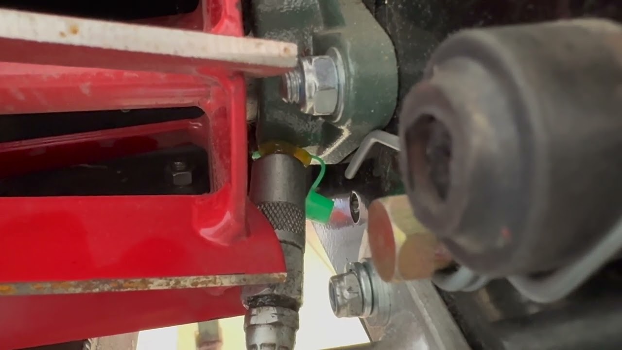 Greasing the Zerks on a Rolux X Series Reel Mower