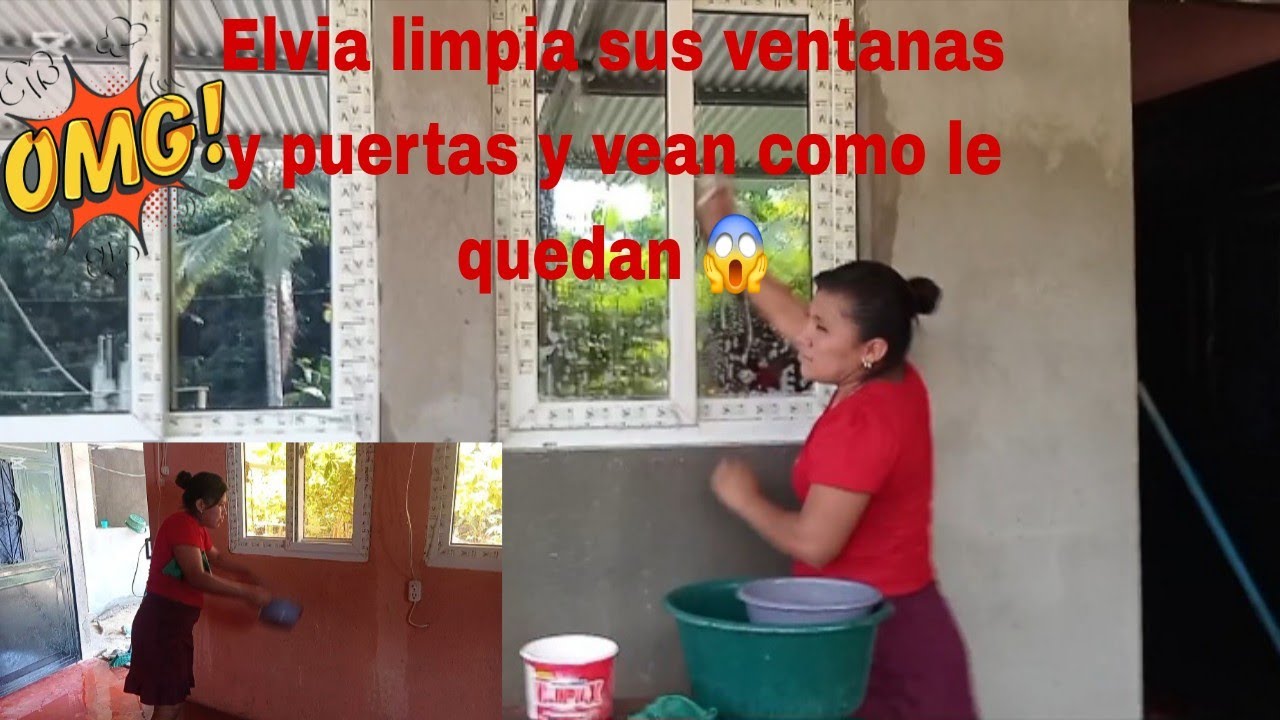 Elvia muy feliz por que ya se terminó de Repellar su casa 🏡ella asea sus ventanas y puertas 🚪 