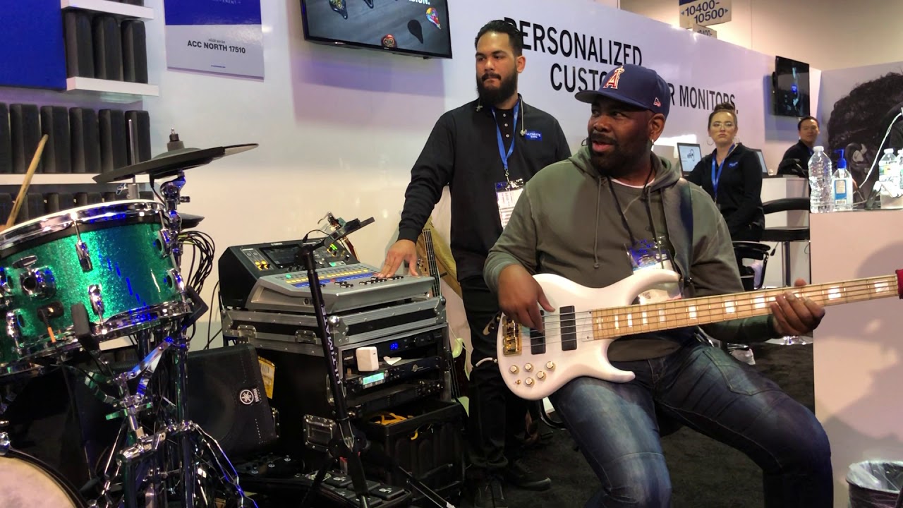 Andrew Gouche NAMM 2019 at ultimate ears booth jamming
