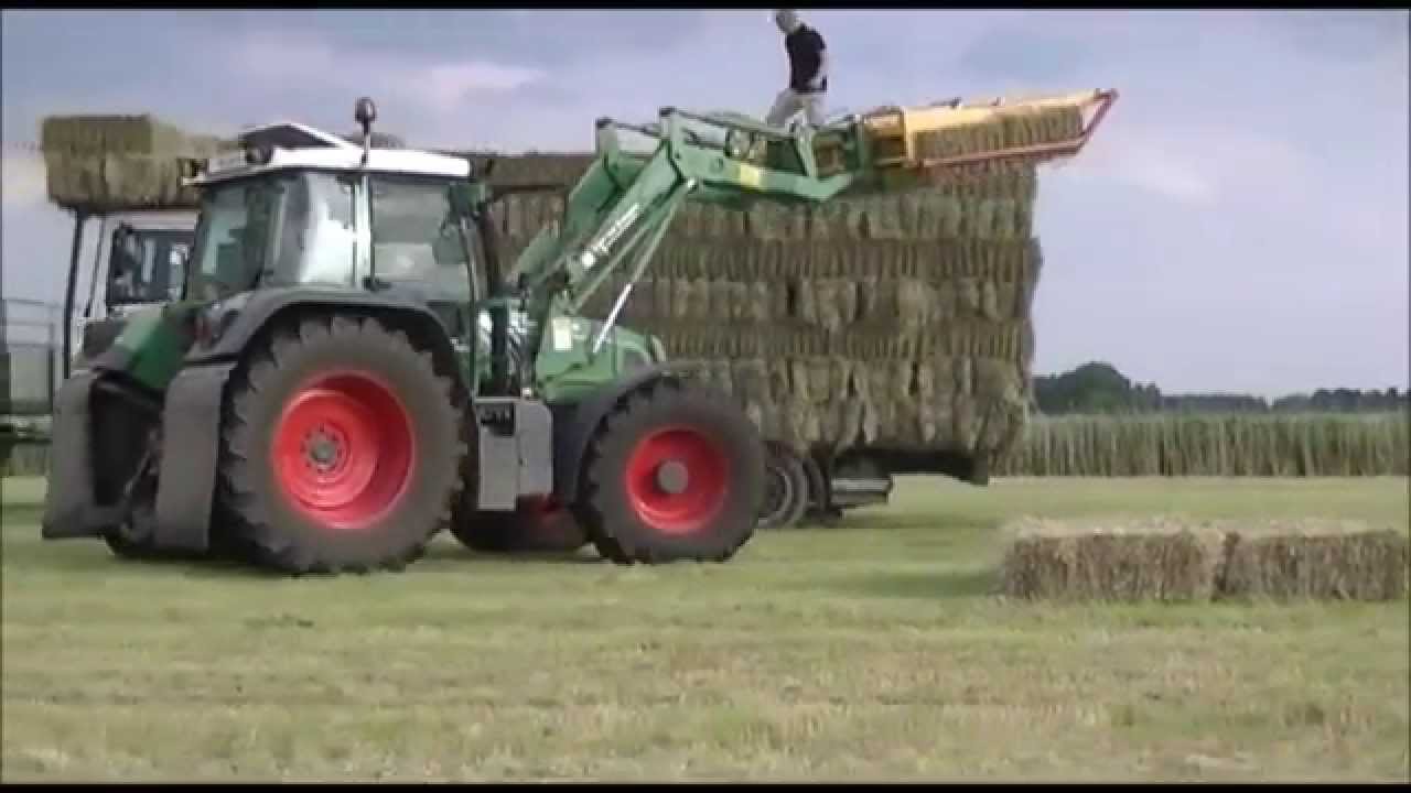 Kleine balen persen, laden en stapelen met van Kempen