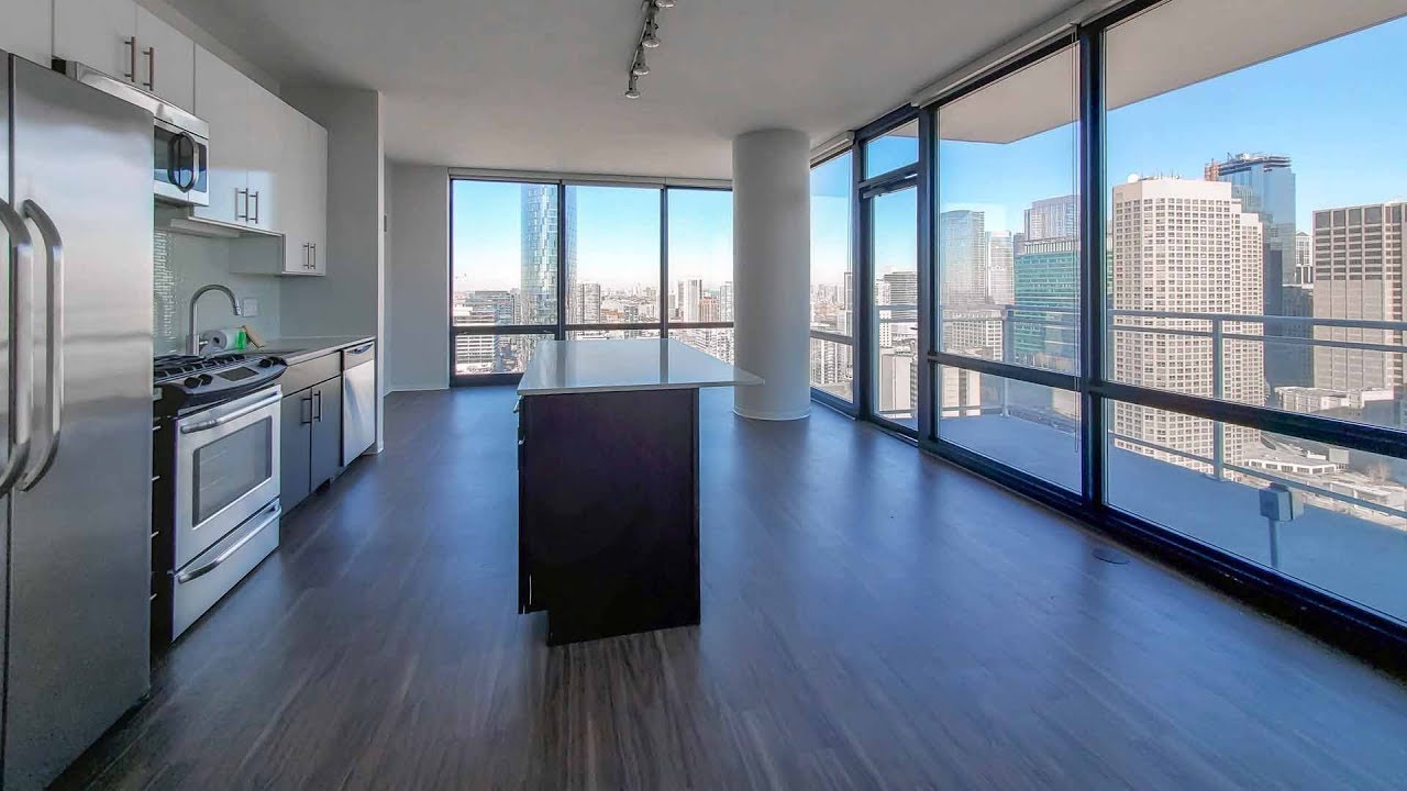 An -01 skyline-view 2-bedroom at the full-amenity Arkadia West Loop