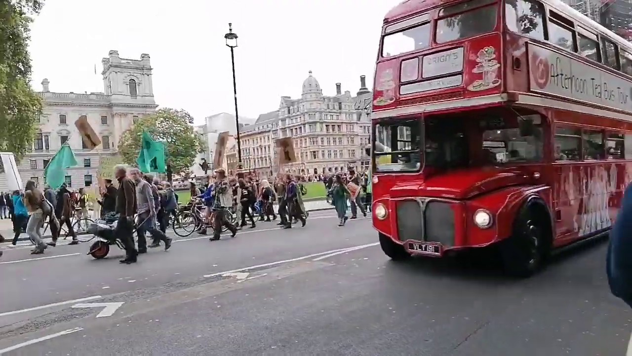 Extinction Rebellion Let their Voice be Heard near Churchill's Statue in Westminster 2019 - Imagine!