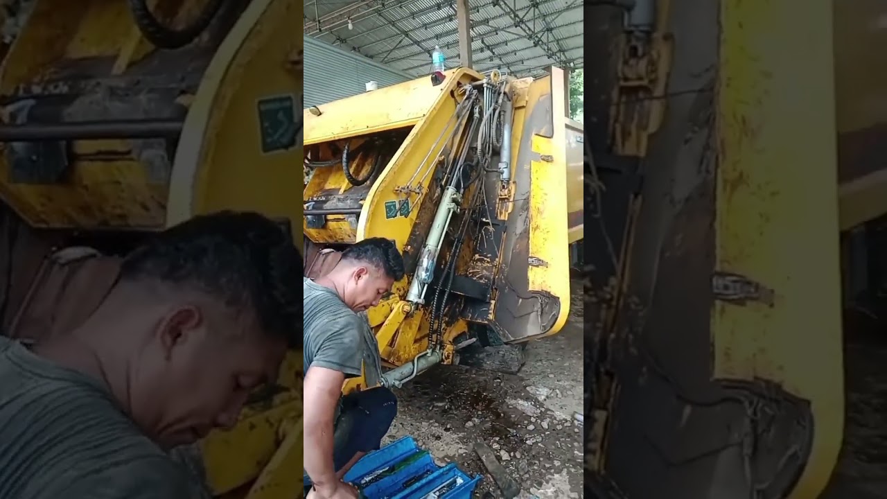 Low power hydraulic system garbage truck compactor. Repair control valve & cylinder boom. Fullvideo 