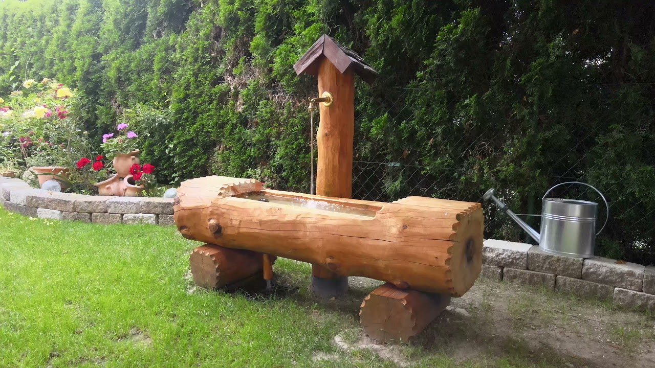 Handgefertigter Holzbrunnen aus Schliersee