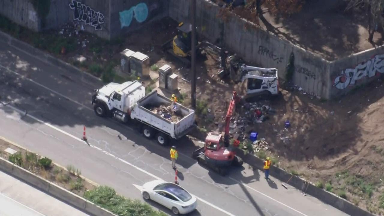 Crews clean up homeless encampments near I-90 in Seattle after rock-throwing incidents