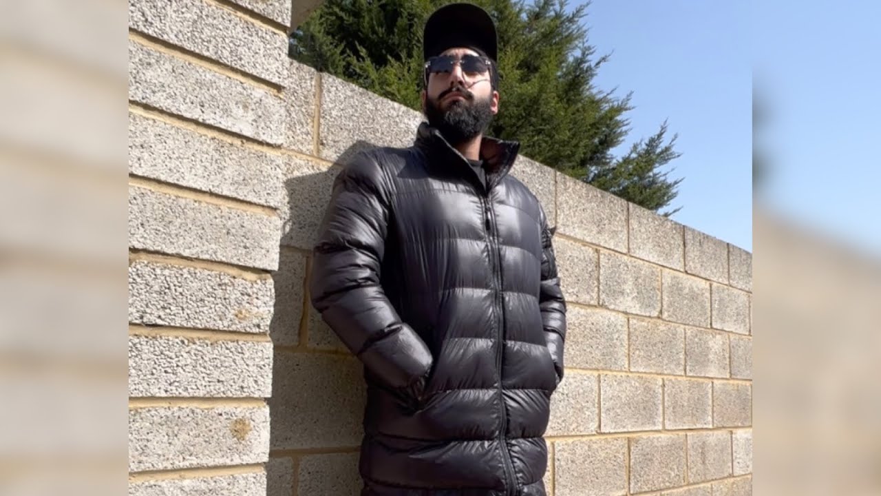 The guy that's still wearing his jacket in the summer