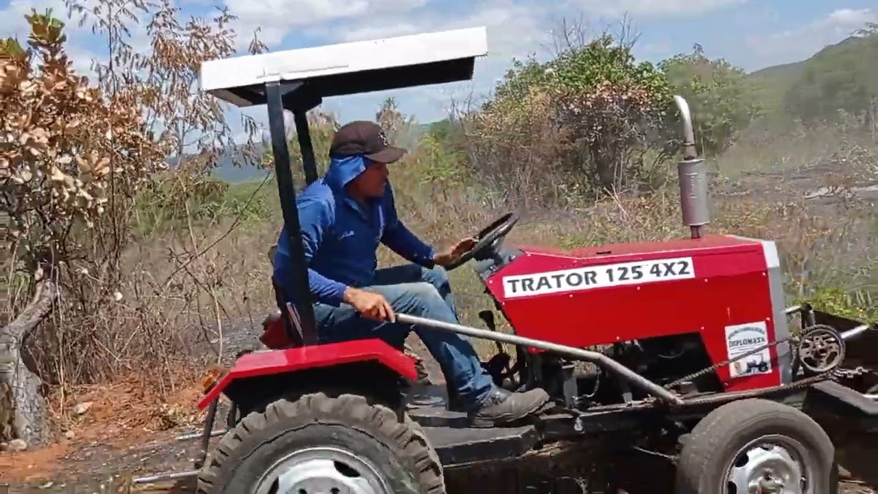 trator caseiro preparando terreno para o corte de terra