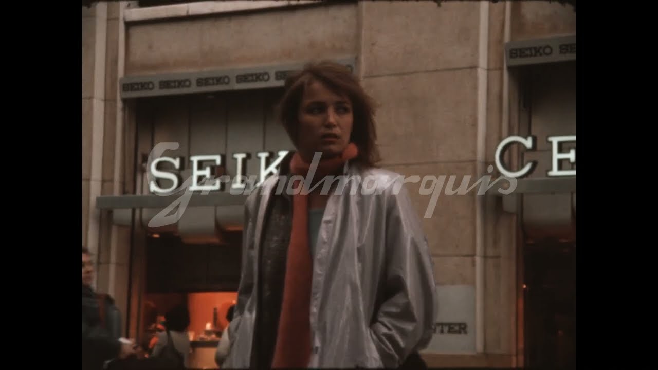 16mm - France - actress Dominique Laffin walking on the Champs-Elysées - Paris - 1980