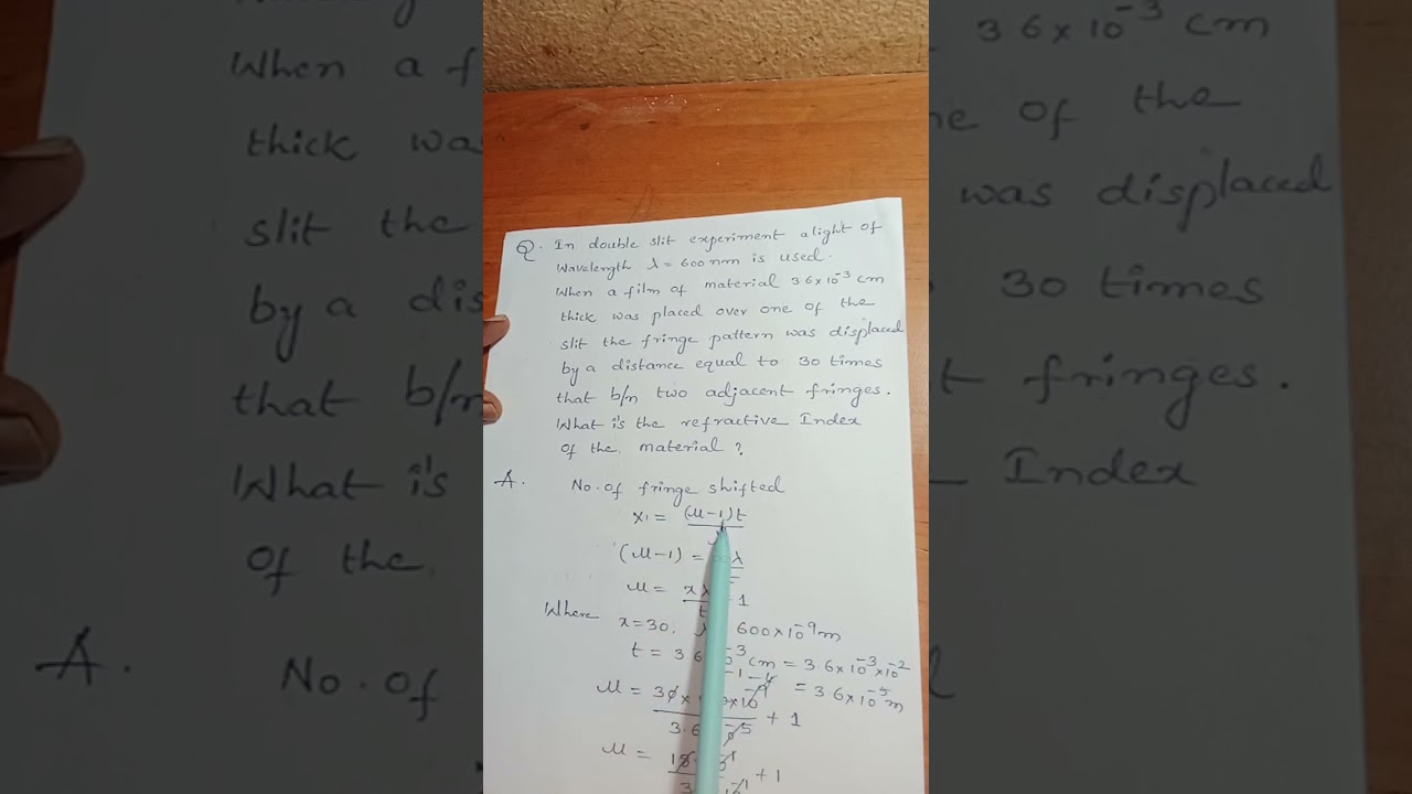 In double slit experiment a light of wavelength lamda 600nm is used when a film of material.......?