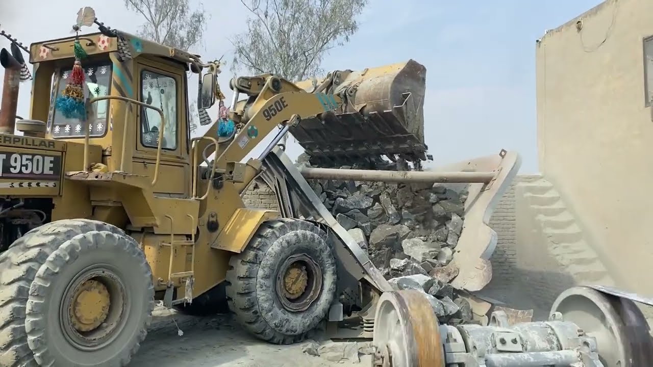 Wheel loader Dumping Stones into Jaw Crusher.amazing stone Crushing service watch full video#machine