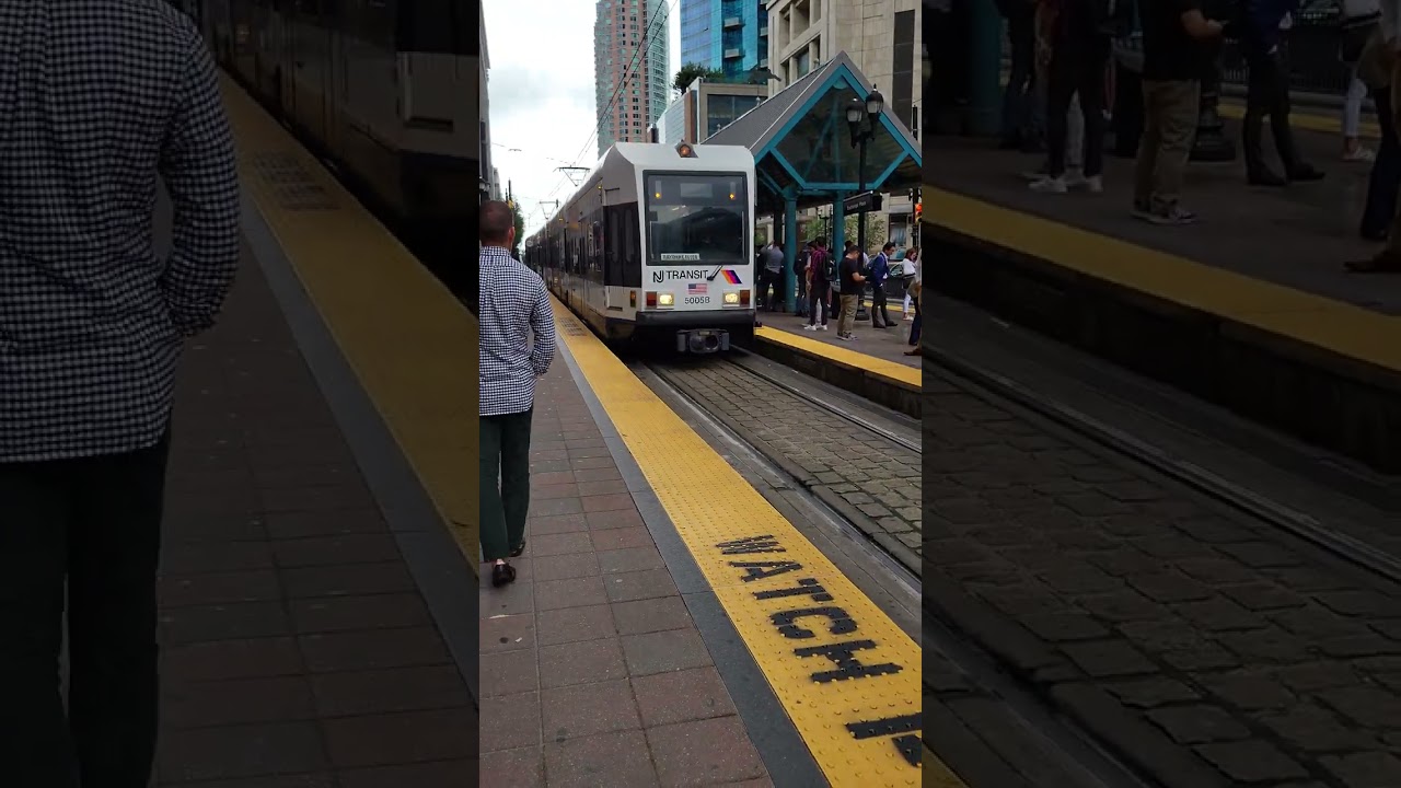 Light rail train arriving at Exchange Place, Jersey City