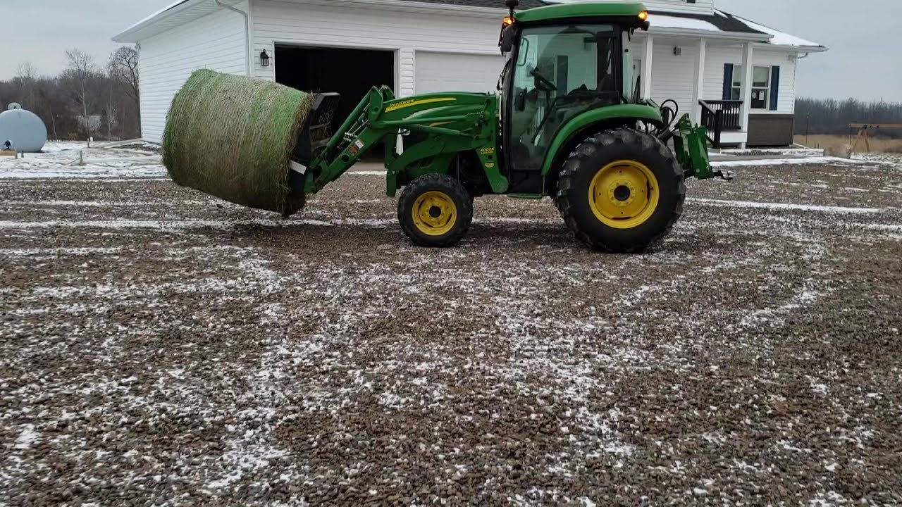 John Deere Hauling Hay Bales