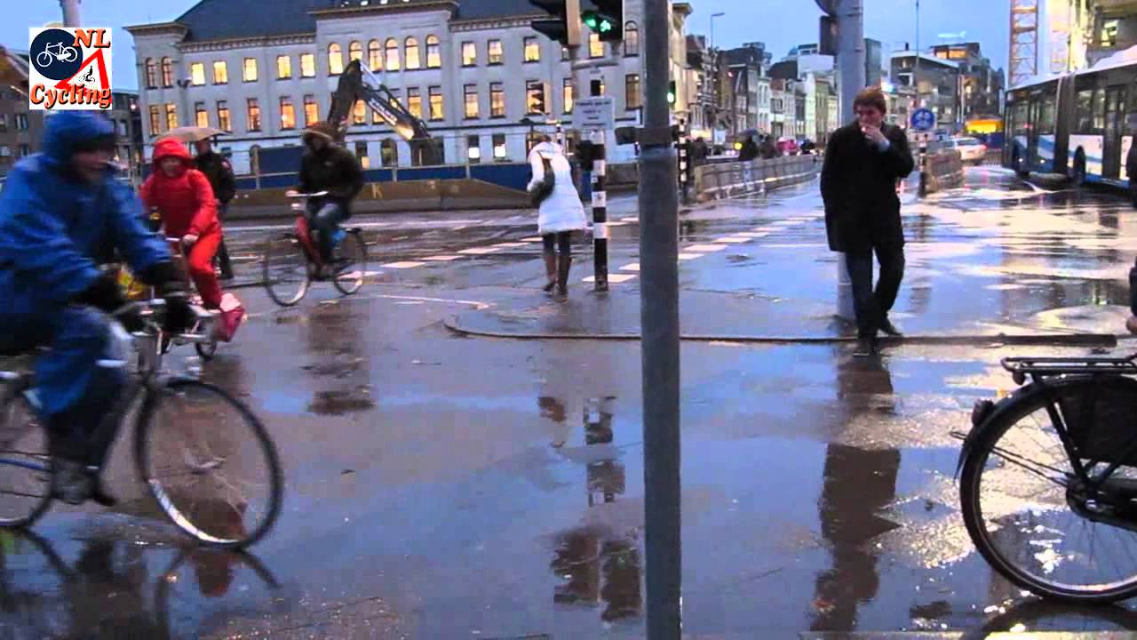 Cycling in the rain; morning rush hour in Utrecht (Netherlands)