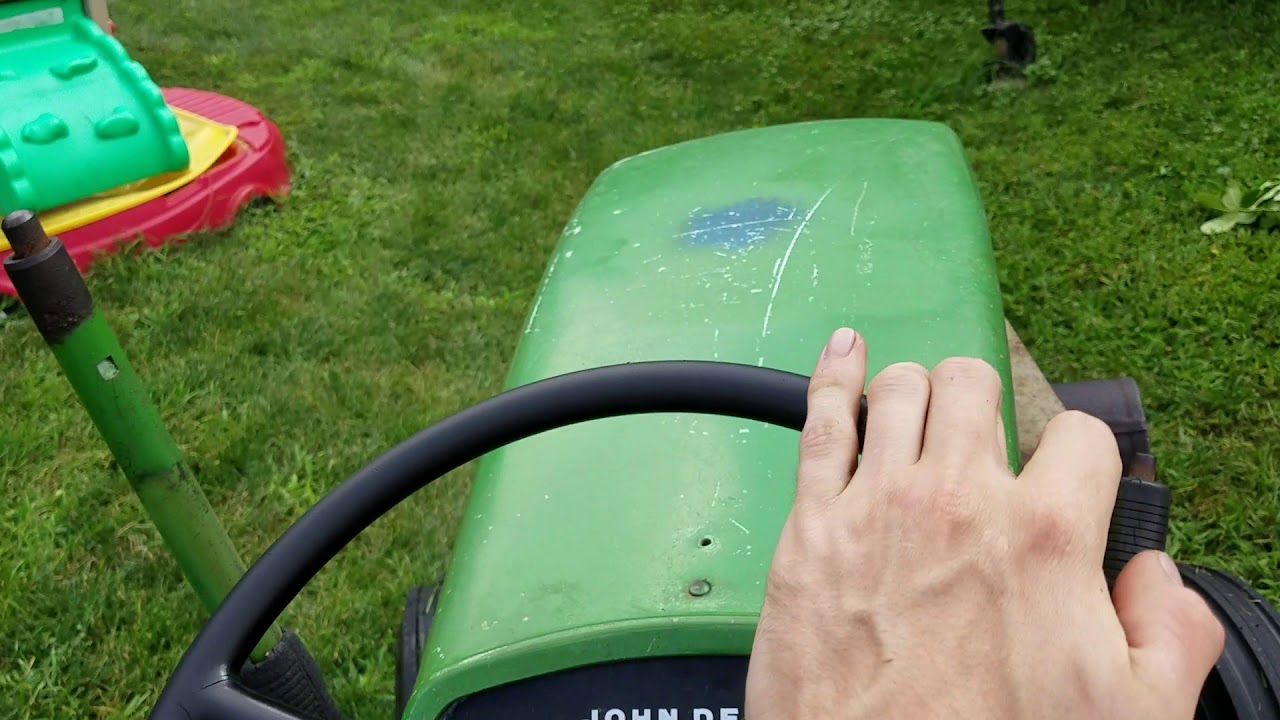 1964 John Deere 110 round fender mowing