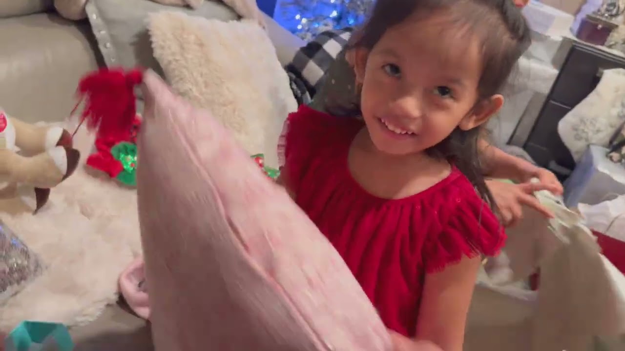 Mikai Opens Her Christmas Gift