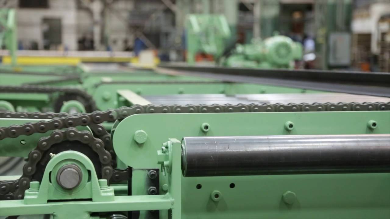 Custom Material Handling System for Bar Straightener
