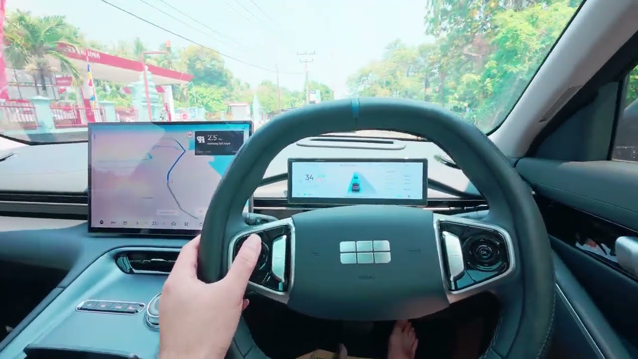 Review mobil listrik Geely sambil jalan ke Anyer Carita. Sekalian demo dan bahas fiturnya