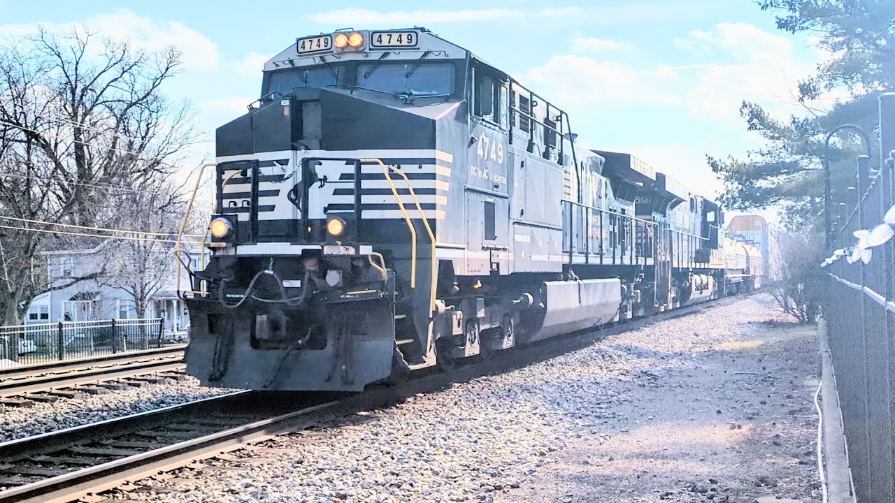 Northbound NS mixed manifest with mid-train DPU on track one 
