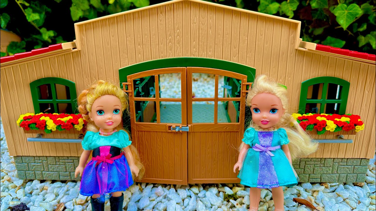 Elsa and Anna toddlers help at the stables with the horses