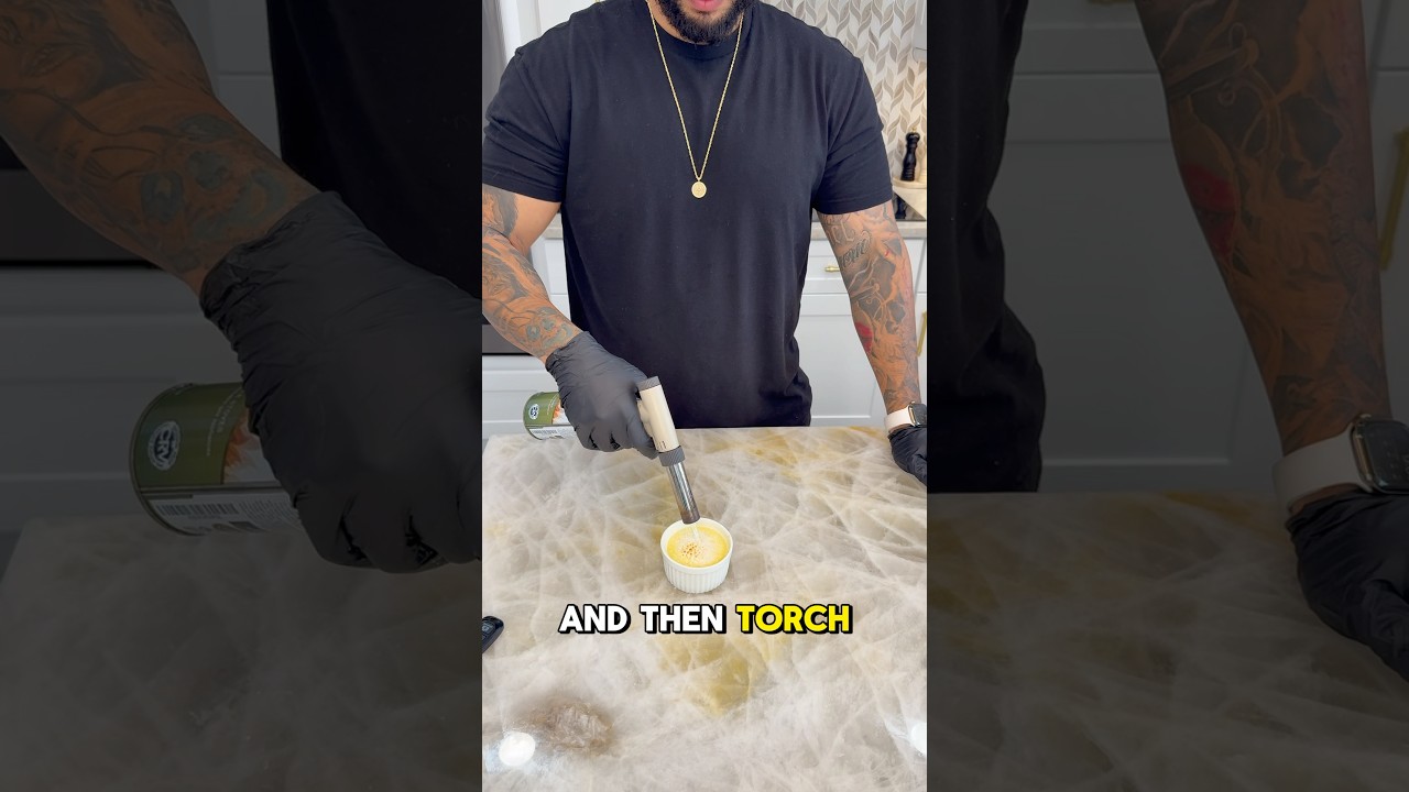 The moment of truth&hellip; Crack! 🔥 Who else loves cr&egrave;me br&ucirc;l&eacute;e? #cookingvideo #easyrecipe #cookingathome