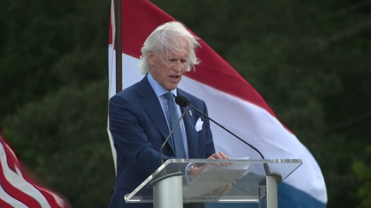 Robert M. Edsel speaks during the Freedom Concert
