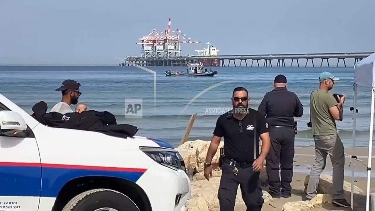 People crowding sharks may have led to attack on missing man off Israeli coast; AP explains
