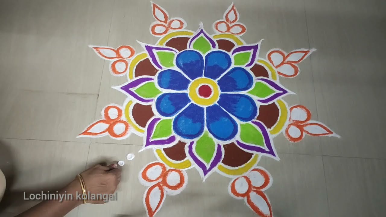 Beautiful and colourful rangoli design for diwali.... Easy and simple rangoli design by lochini...