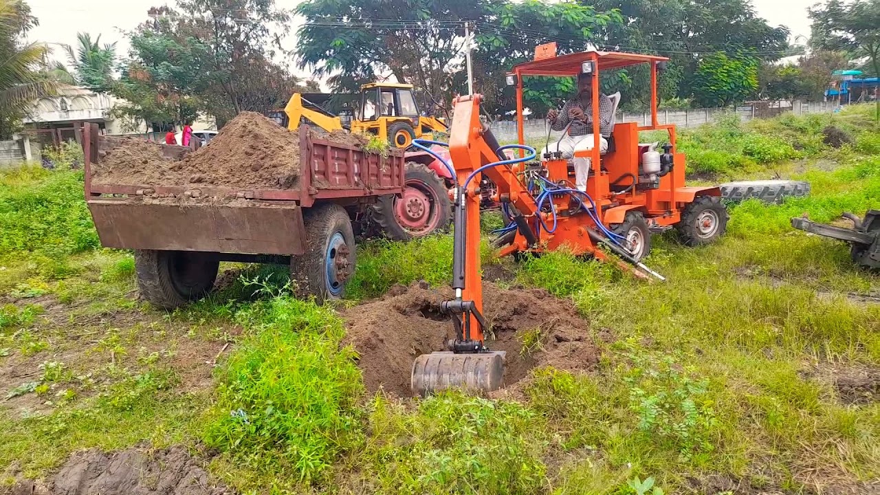 pipeline work and tractor loading @tomgo stabilizer backhoe price:400000₹ cell:7200011186,9842106636