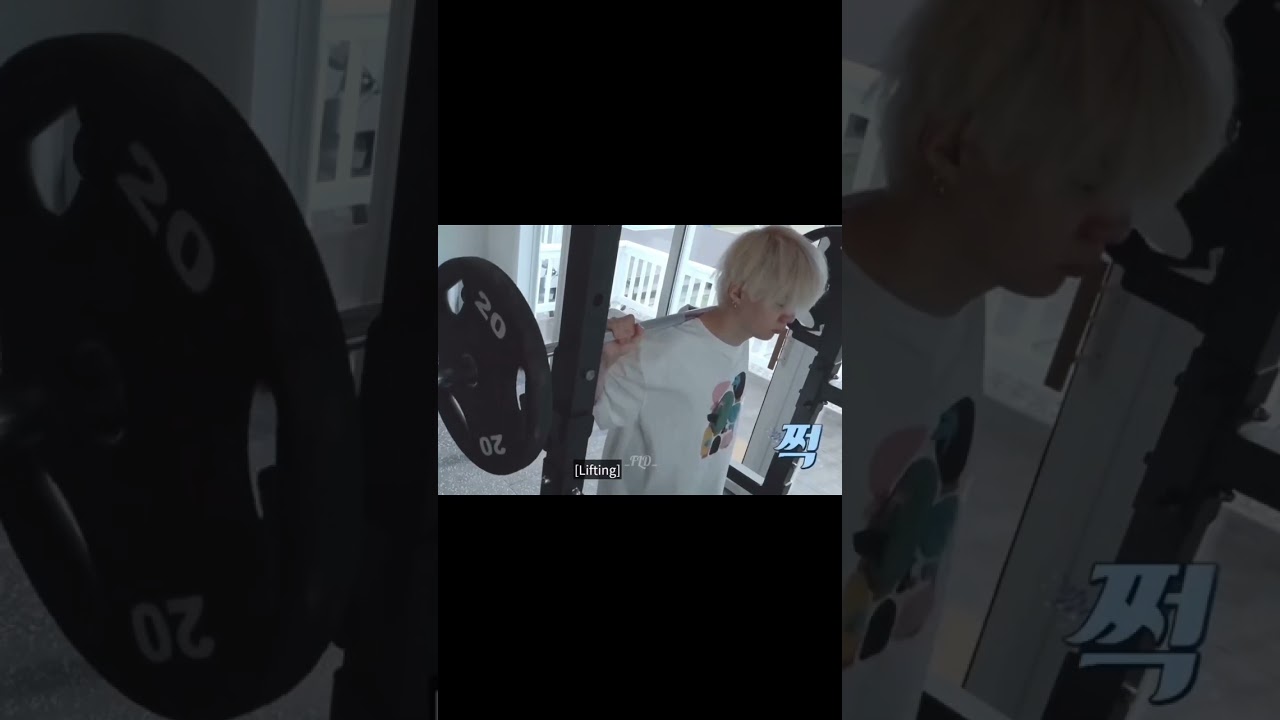 Suga lifts weights at the gym 