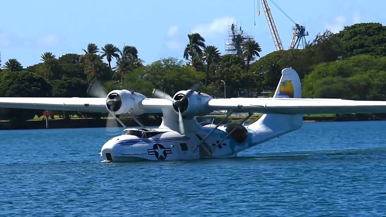 WW2 PBY Catalina Amphibious Aircraft Conducts Water Takeoff At Pearl Harbor, Hawaii