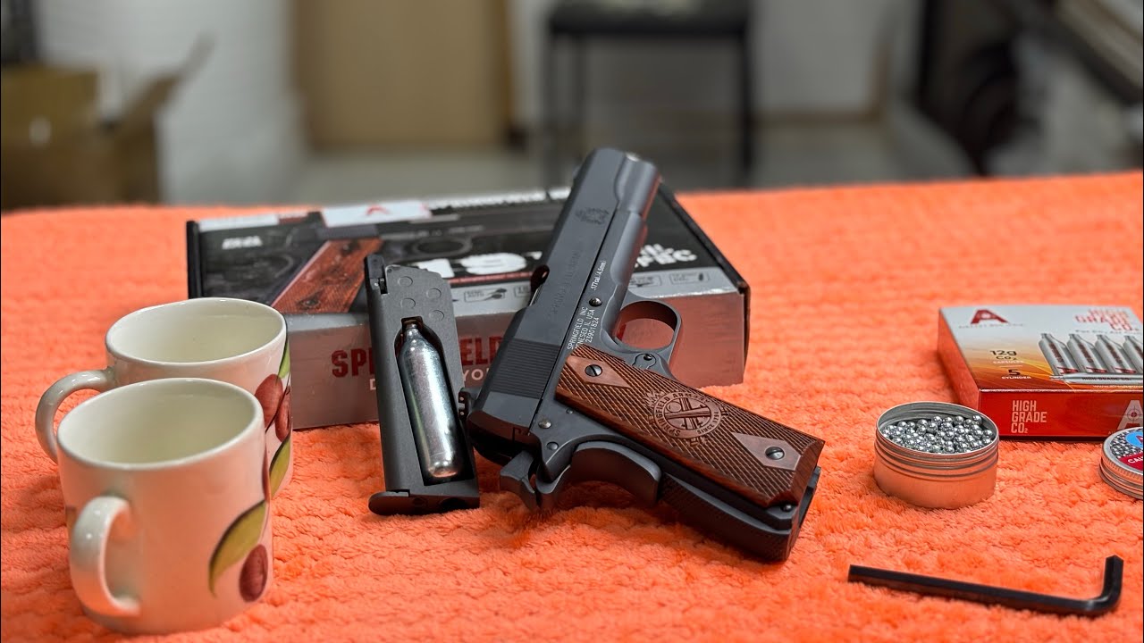 Springfield Armory 1911 Mil-Spec Co2 BB Air Pistol vs coffee cup firing test