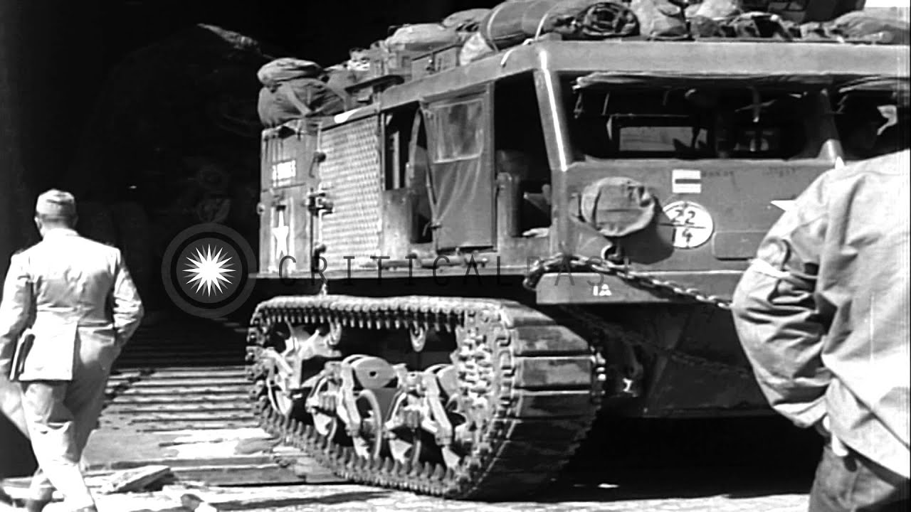 U.S. forces loading on ships in England for the invasion of Normandy in World War...HD Stock Footage