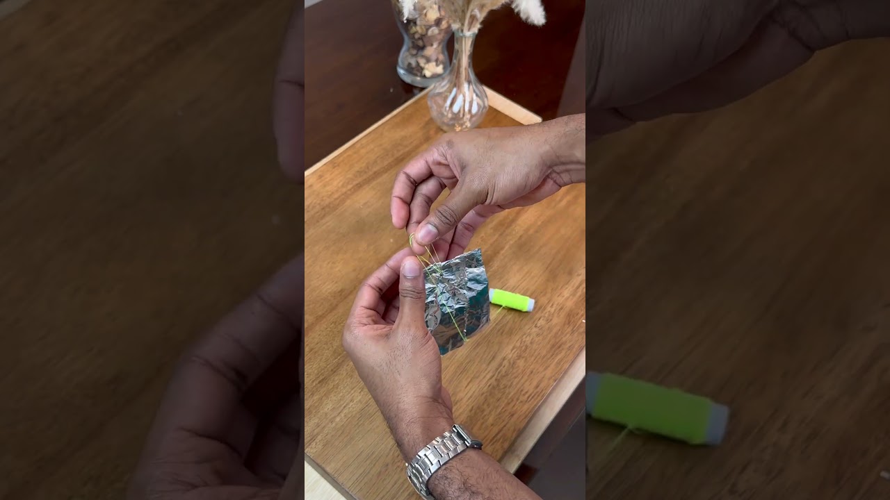 Hang aluminum foil on a branch