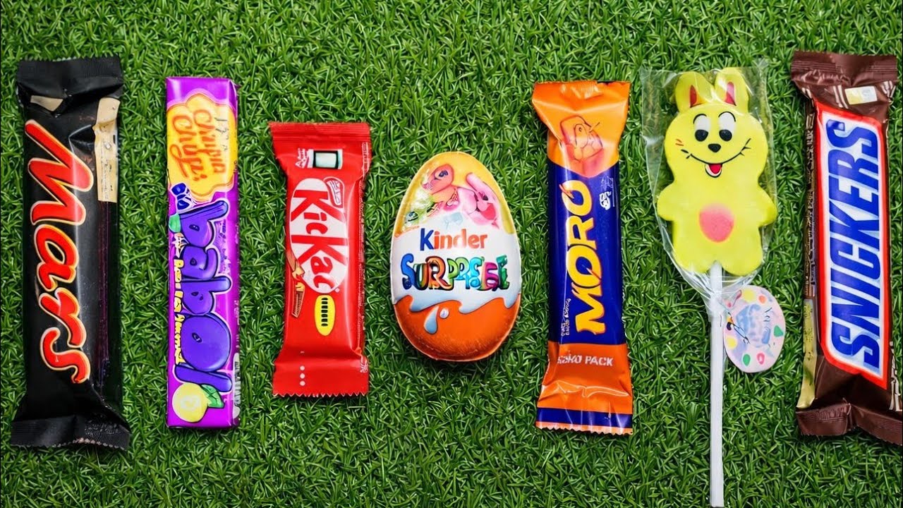 Most Asmr popular candys some lots of colorful rainbow lollipop candy unpacking chocolate eat