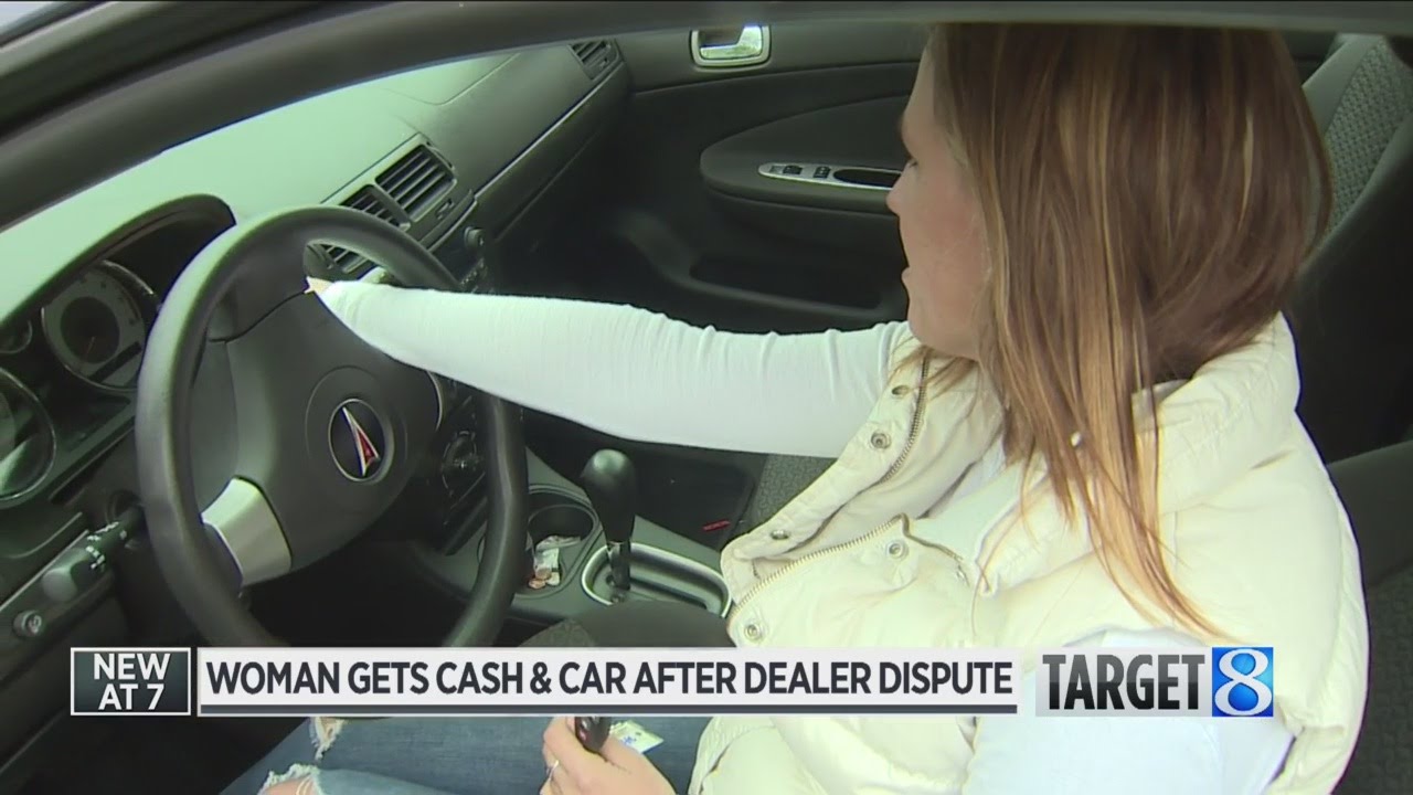 Woman gets cash and car after dealer dispute