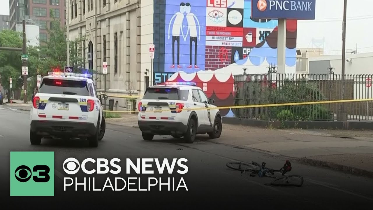 Philadelphia police car hits cyclist as they try to pull over another car connected to shooting