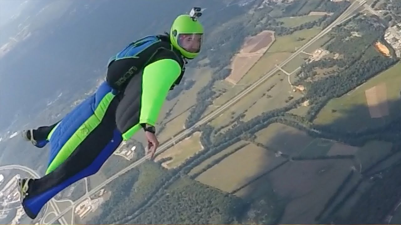2 Way Wingsuit Flock by the Clouds - 00694
