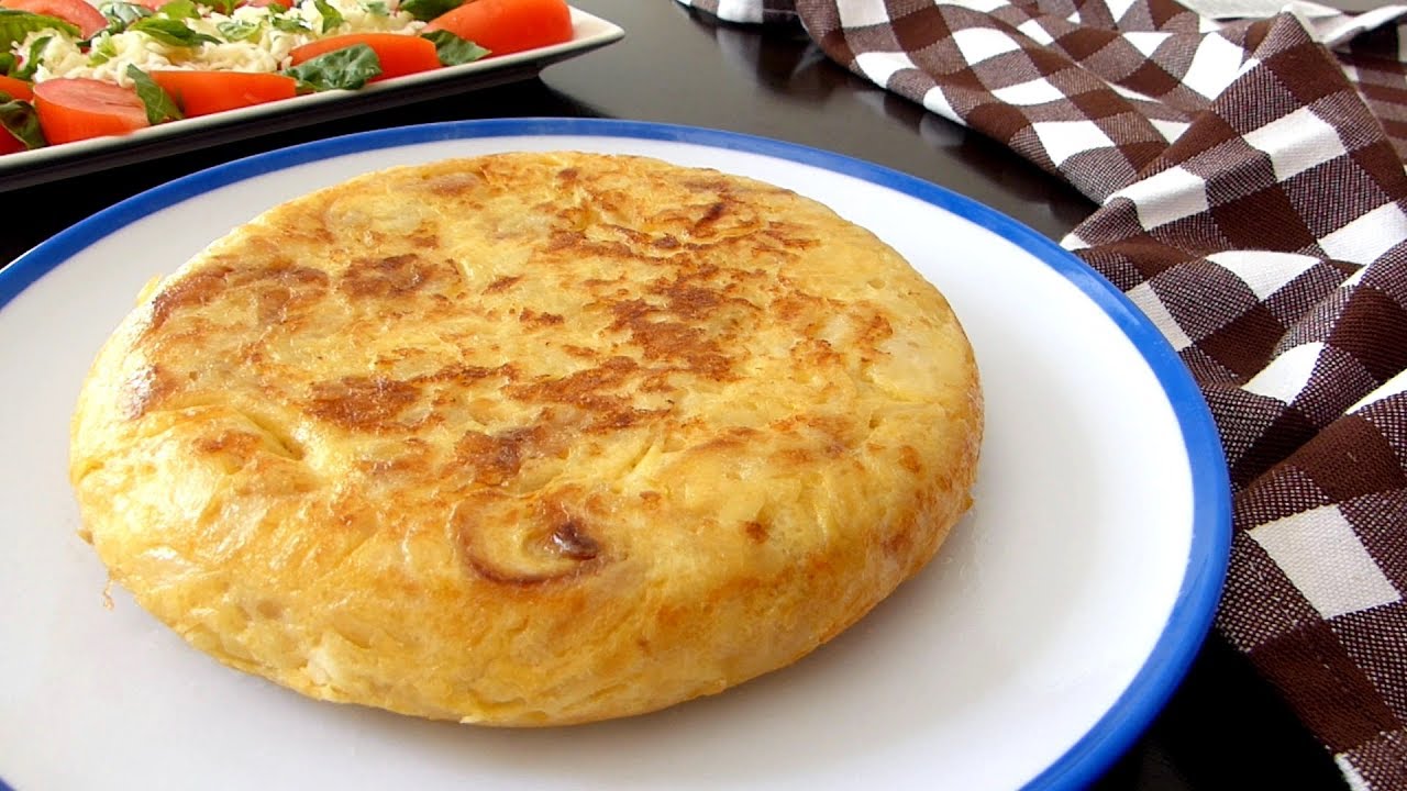 Cómo hacer tortilla de patatas con cebolla. La AUTENTICA tortilla española muy jugosa.